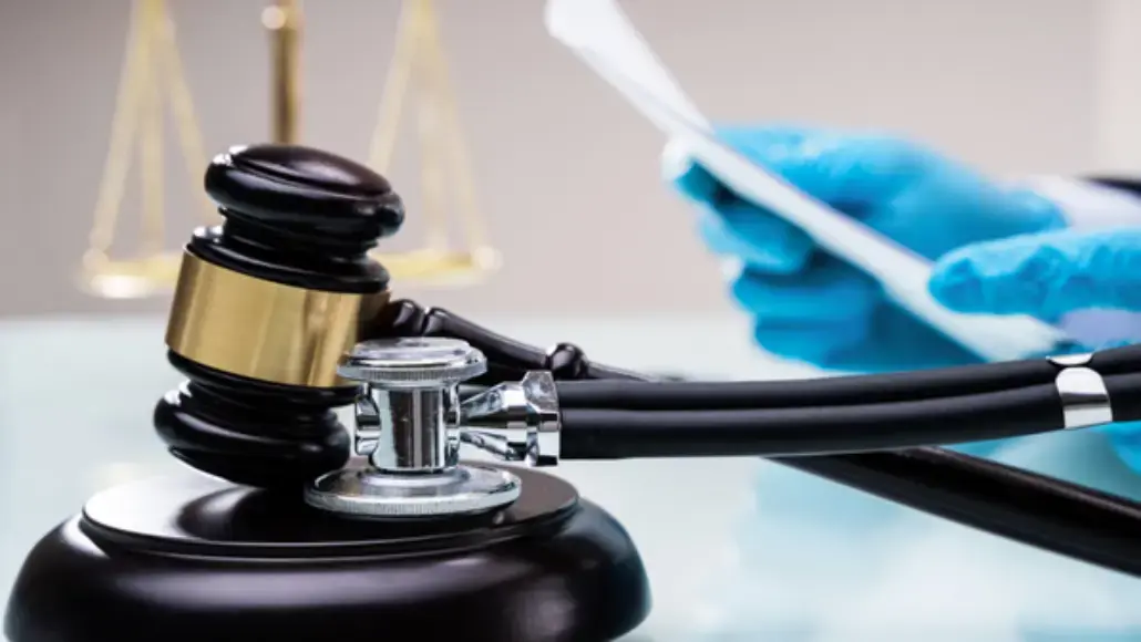 Gavel with a stethoscope, symbolizing health law and medical justice.